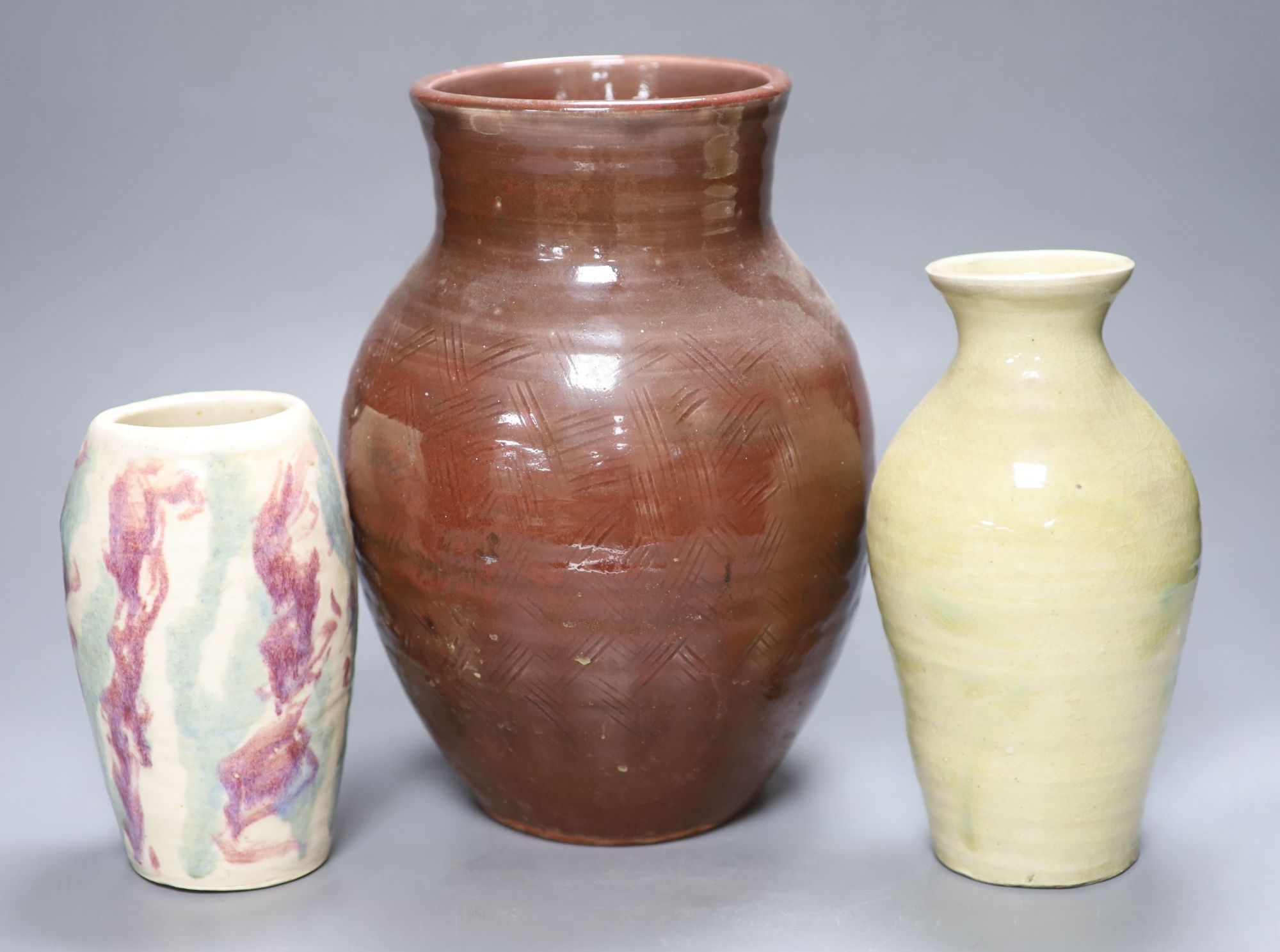 James Walford (1913-2003). An incised red glazed vase and two others, impressed marks, tallest 28cm